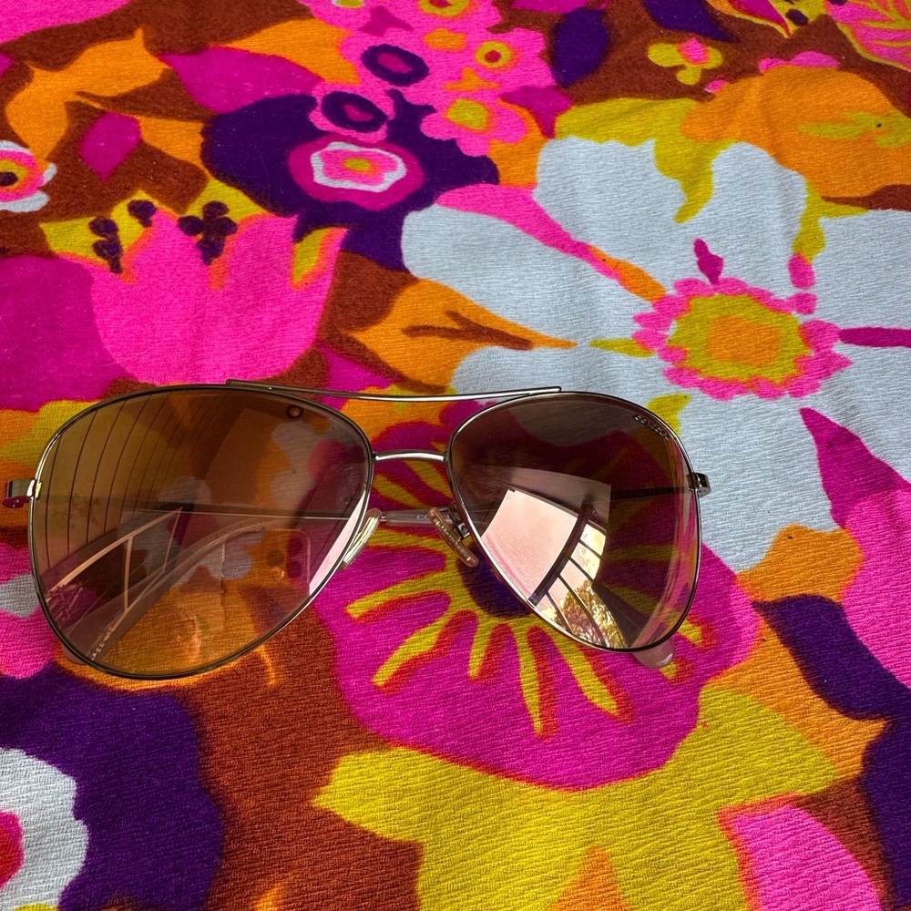Coach Gold Aviator Sunglasses with Gradient Lenses